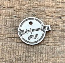 Load image into Gallery viewer, Dog ID tag with banjo instrument design deep engraved on round metal tag, personalised engraved pet tag for bluegrass and music lovers.