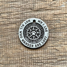 Load image into Gallery viewer, Personalised compass dog ID tag with engraved wander quote and paw design, durable metal pet tag for outdoor and travel dogs