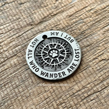 Load image into Gallery viewer, compass dog ID tag with paw design and not all who wander are lost quote deeply engraved into metal, personalised adventure pet tag