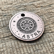 Load image into Gallery viewer, Dog ID tag with compass and star design and the name Astra engraved, personalised deep engraved metal pet tag with travel and adventure theme.