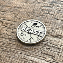 Load image into Gallery viewer, Dog ID tag with cracked stone texture and engraved name, personalised deep engraved metal pet tag for dogs and cats.