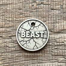 Load image into Gallery viewer, Dog ID tag with cracked stone texture and engraved name, personalised deep engraved metal pet tag for dogs and cats.