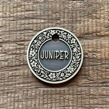Load image into Gallery viewer, Dog ID tag with floral flower border design and engraved name Juniper, personalised deep engraved metal pet tag for dogs.