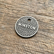 Load image into Gallery viewer, Dog ID tag with ornate scroll pattern and the name Winston engraved, personalised deep engraved metal pet tag with elegant vintage design.
