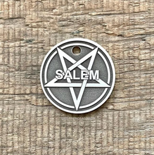 Load image into Gallery viewer, Dog ID tag with pentagram star symbol deep engraved on round metal tag, personalised engraved pet tag with the name Salem.
