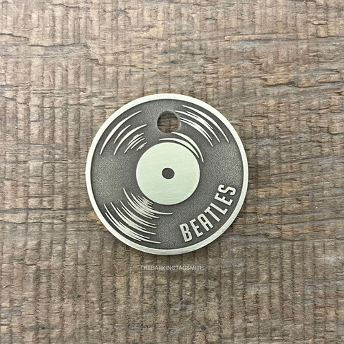 Pet Tag in the style of a Vinyl Record