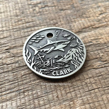 Load image into Gallery viewer, Dog ID tag with shark and underwater ocean scene and the name Clark engraved, personalised deep engraved metal pet tag with marine and shipwreck design.