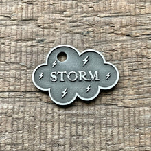 Load image into Gallery viewer, dog ID tag with storm cloud design, personalised deep engraved cloud shaped pet ID tag for dogs and cats in nickel silver, New Zealand made