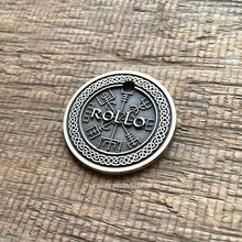 Load image into Gallery viewer, Personalised Viking compass dog ID tag with engraved Vegvisir Norse symbol and Celtic knot border in brushed silver metal on rustic wood background