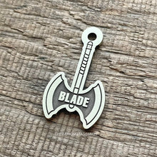 Load image into Gallery viewer, Dog ID tag shaped like a Viking battle axe with the name Blade deep engraved, custom engraved metal pet tag with bold warrior themed design.