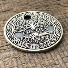 Load image into Gallery viewer, Dog ID tag with Viking Tree of Life design deep engraved on round metal tag, personalised engraved pet tag featuring the name Freyja.