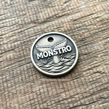 Load image into Gallery viewer, Personalised whale tail dog ID tag deeply engraved into solid metal with ocean wave design for dogs and cats
