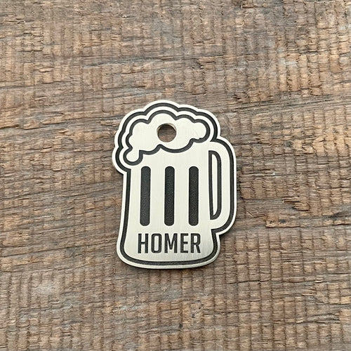 pet tag shaped as a beer