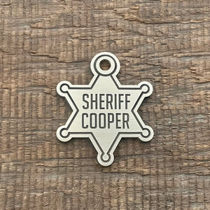 pet tag shaped like sheriff badge