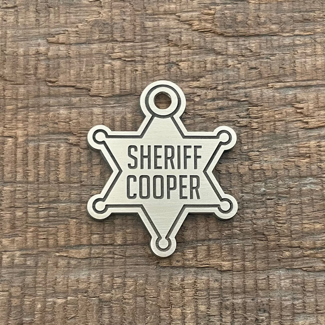 pet tag shaped like sheriff badge