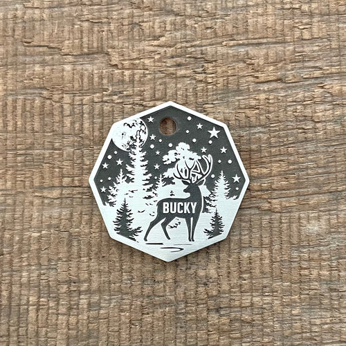 pet tag with deer and forest design