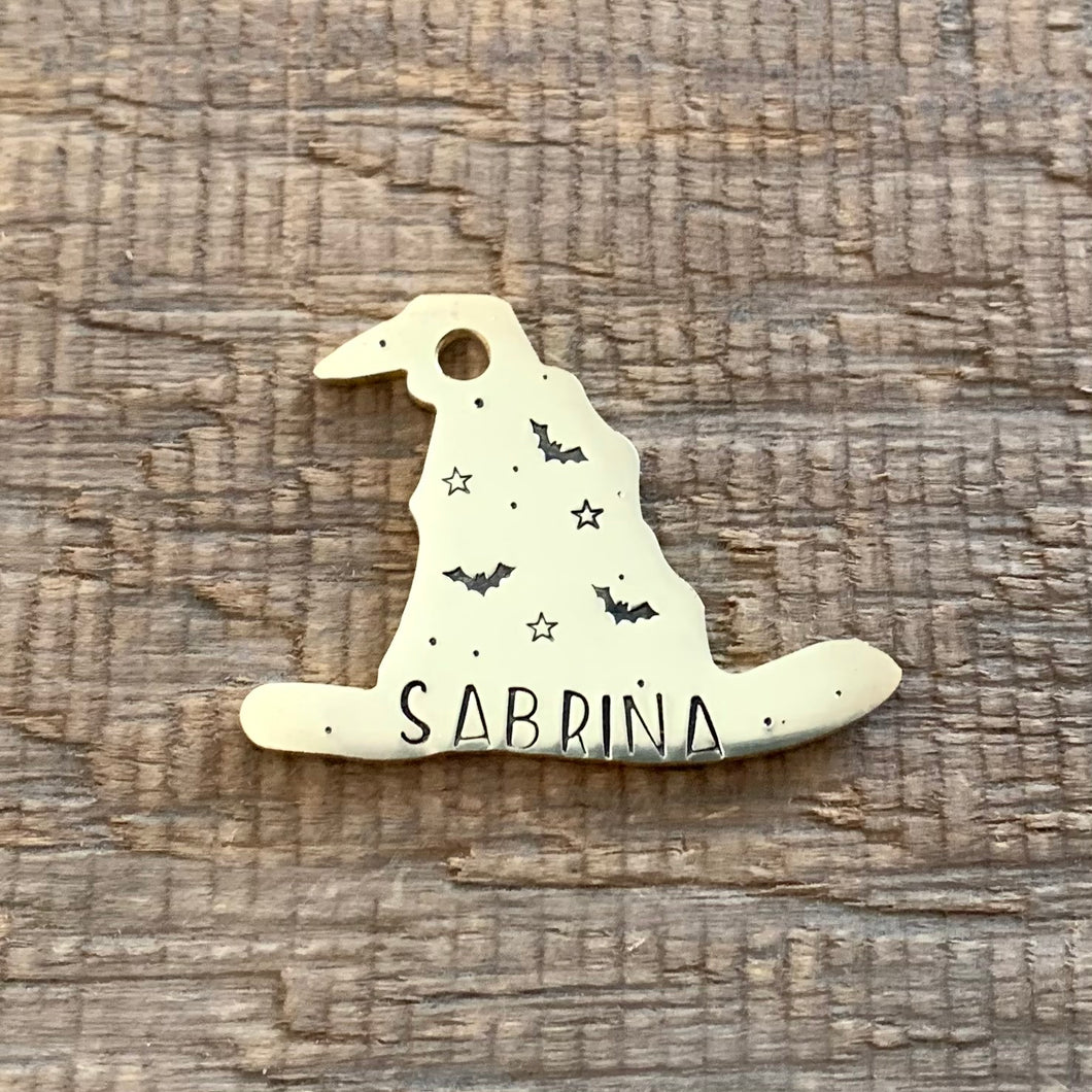 pet tag shaped as a witches hat