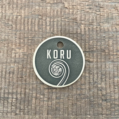 Koru designed pet ID tag