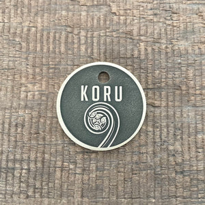 Koru designed pet ID tag