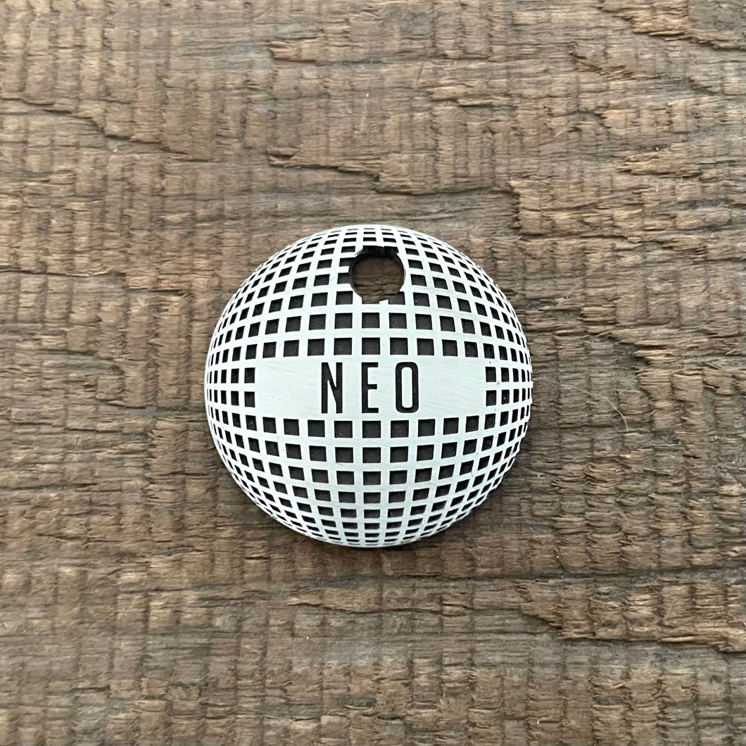 Pet tag with square pattern design