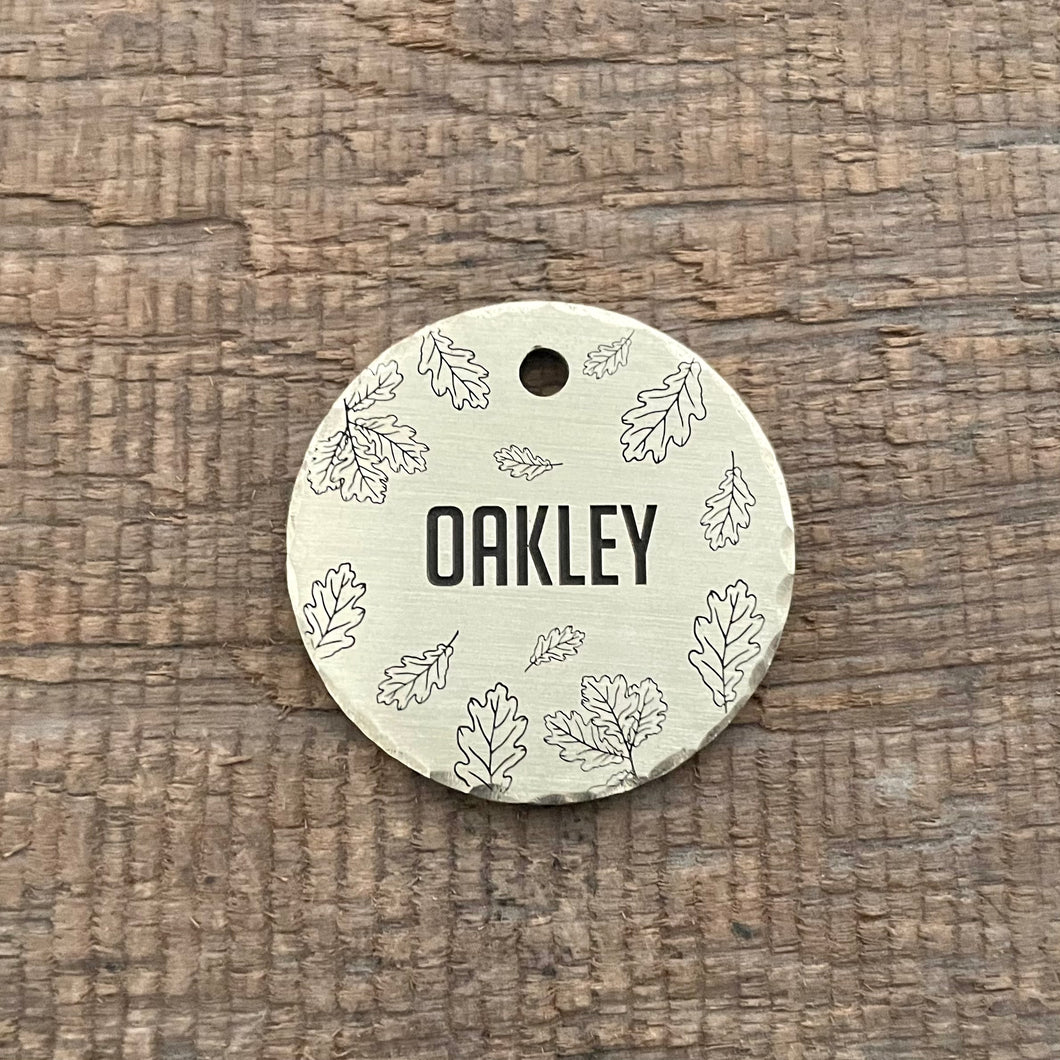 pet tag with oak leaf design