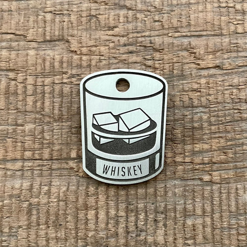pet tag shaped as a whiskey glass