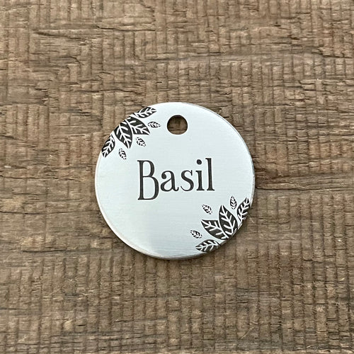 Pet tag with basil leaves