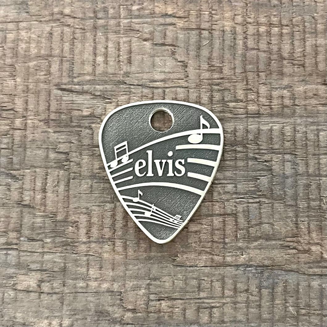 pet tag shaped as a guitar pick